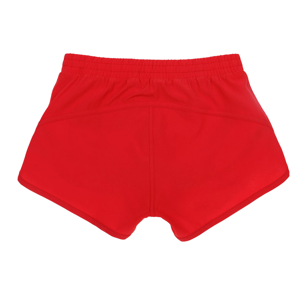 Sustainable red athletic shorts for girls, designed for gymnastics, running, and active sports with built-in brief and hidden pocket.
