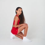 Girls little athletics red sports shorts with side pocket