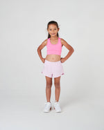 Girls pink sports shorts in sustainable fabric