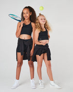 Black bike pants for girls with a high-waisted fit, perfect for dance, athletics, netball and school sports. perfect girls activewear with pockets.