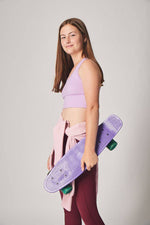 Breathable and flexible purple crop top for girls, ideal for gymnastics, dance, running, and school PE.